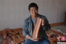 广西奇石似猪肉 因美好寓意受中国民众青睐图片