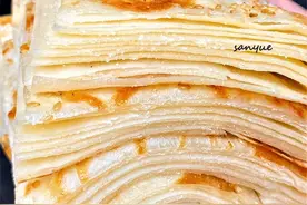 发面芝麻千层饼，松软多层、外焦里嫩，看着都要流口水了！图片