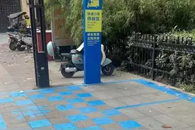 西安高新区城管局守护视障人士“脚下的安全”图片