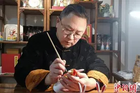 （新春走基层）“兔子王”兔年热销：泥韵传神出指端 中国神话IP遇见民间工艺图片