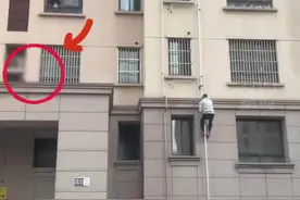 “身手矫健，一身正气！”男子化身现实版“蜘蛛侠” 徒手爬楼救下被困男孩图片