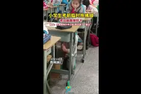 小学生考前临时抱佛脚，考试前跪地拜书图片