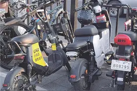 共享电单车乱与治图片