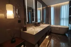 成年子女能不能和父母同住一个标间？广州酒店业有不同解读→图片