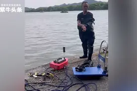 在西湖捞手机收1500元被质疑，职业打捞员：正规平台接单，价钱商量好图片