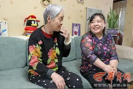 母亲节关注残疾人母亲：艰难让母爱的光芒愈亮 她们却道是寻常图片