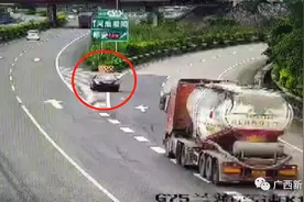 导航提示“掉头”，都安一司机高速路上倒车一公里图片