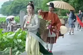 西湖边“卖花姑娘”走红系炒作？最新回应图片