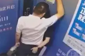 男子实名举报妻子出轨高校领导：视频中一男一女电梯里搂抱，男子不停抚摸女子头发，校方：将调查通报图片