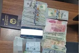 西安的哥捡到护照外币 热心联系归还失主图片