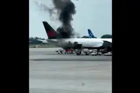 果然视频·看天下|加拿大蒙特利尔机场一客机“惹火烧身”图片