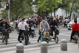 广州电动自行车管理大家谈：依法加强管理势在必行图片