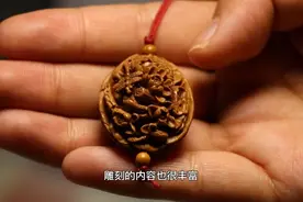 果然视频丨枣庄这位手艺人真不一般！小小果核上竟雕镂出万千世界图片