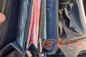 粗心乘客遗落钱包 西安热心的哥送还图片