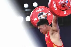 时隔九年再夺亚运金牌 “超级英雄”田涛重回巅峰图片