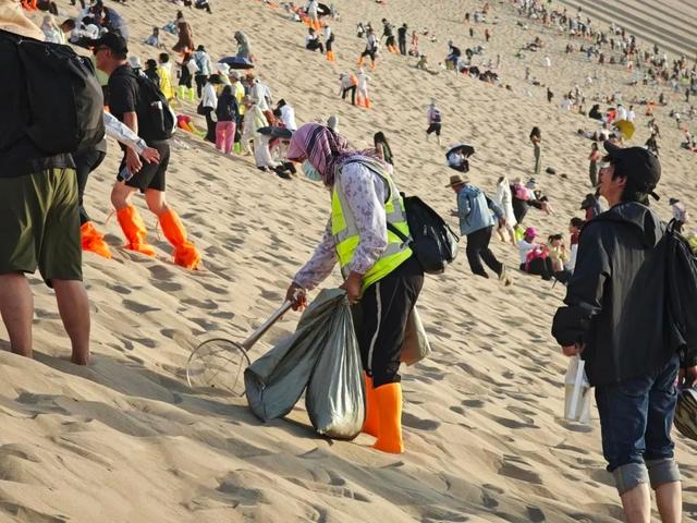 轻装而来 洁净而归 鸣沙山月牙泉环保倡议书