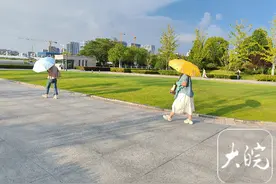 合肥出现短暂“东边日出西边雨”，一座城市几重天图片