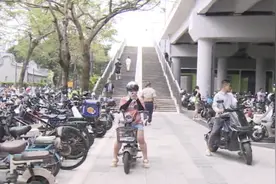 现场直击！广州一地铁口，多辆“电鸡”被拖走扣留图片