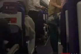 大阪飞上海客机下降时一男子欲开舱门，刑拘！图片