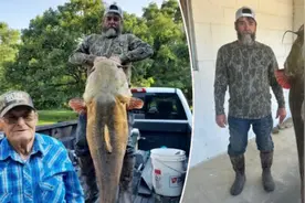 美国渔民钓到一条43公斤重的鲶鱼图片