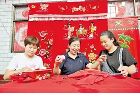 银针彩线绣出好日子图片