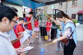今潮8弄里打弹子、扯铃子、学说上海话……夏日社区体育传承海派文化图片