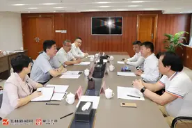 王琛会见老挝中华总商会会长姚宾图片