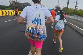 锐评丨“能量胶”打包？跑马拉松“进货”，跑出了“负能量”图片