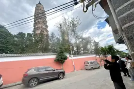 无人机穿越大理千年古塔时“炸机”，处理结果来了图片