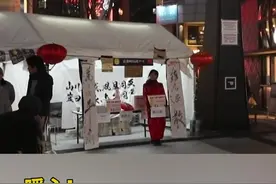 暖心！寒风中，这个14岁日本女孩鞠躬为武汉募捐！