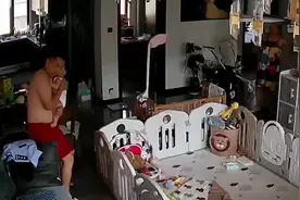 爸爸晕倒瞬间第一反应是护住孩子图片